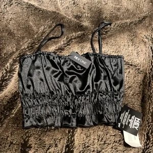 Topp - Ny, prislapp kvar! 