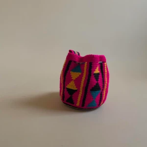 Vintage Mini Mochila Drawstring Bucket Bag - This mini bucket bag is constructed in Colombia with colorful threads made of Cotton and Aloe.  Drawstring Closure with Fringed Pom Poms.