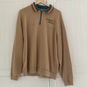Tröja Crooked toncues - Storlek M oversized
