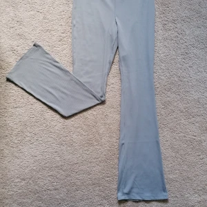 Bell-shaped trousers - Bell-shaped ribbed trousers. Made of polyester.  Work well for someone taller than 170 cm. 