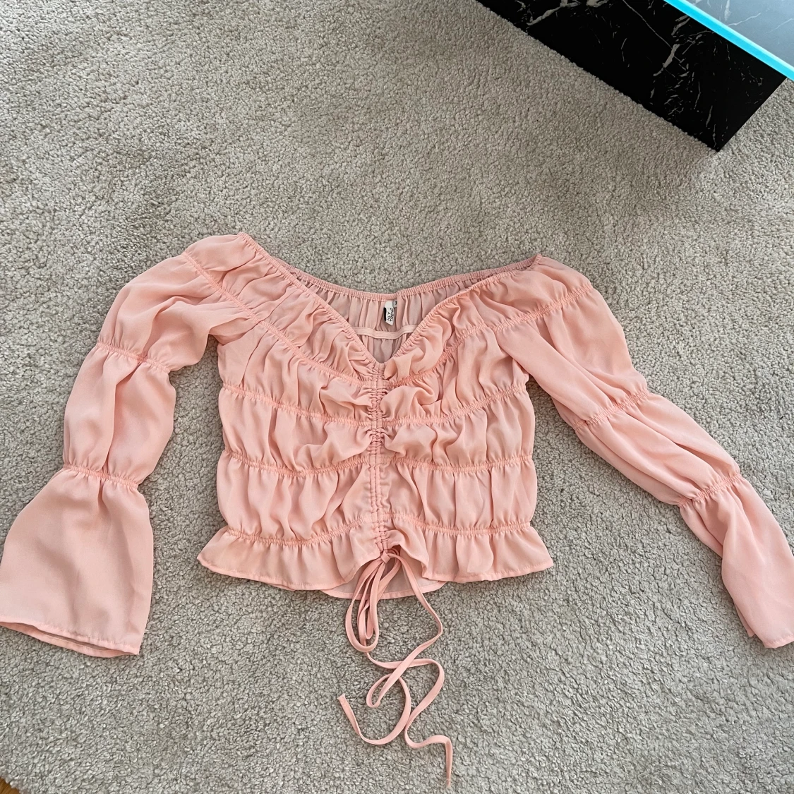 Rosa topp från Nelly.com