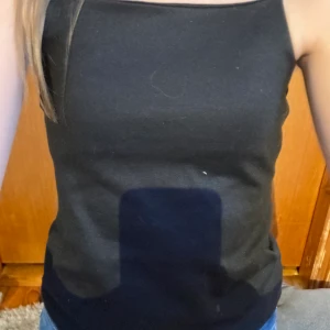 Svart linne - Svart snyggt linne i storlek Xs 