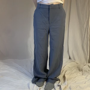 Grå/blå byxor - Midja-70cm😊 innerbenet-85cm
