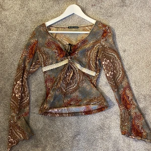 Mönstrad tröja! - Långärmad mönstrad tröja som inte används längre!