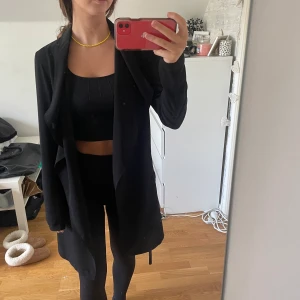 Kappa - Tunn kappa från vila, strl xs