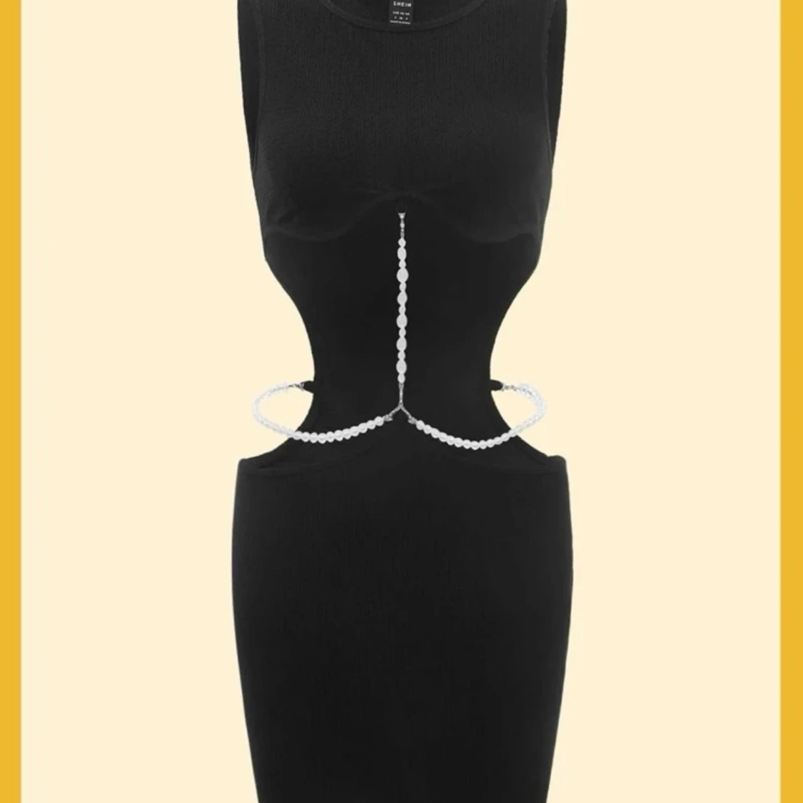 Svart klänning med pärlor 