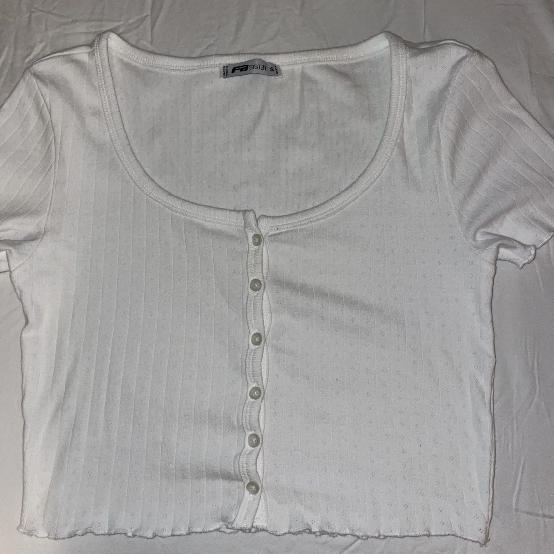 Vit topp, storlek S