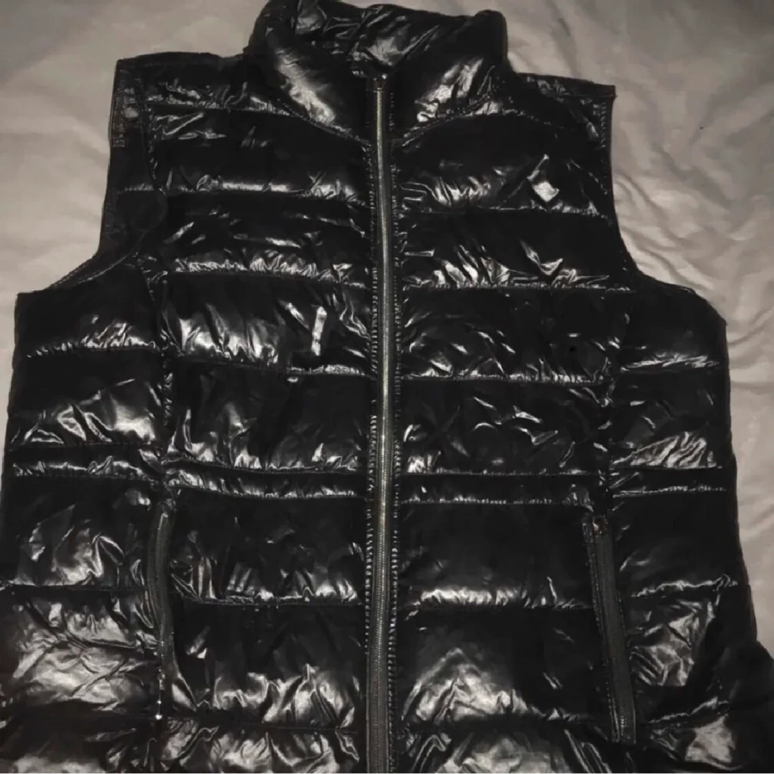 Glansig väst / dunväst 