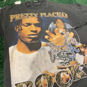 Vintage asap Rocky  - Säljer denna vintage likande asap Rocky tröja   Grå färgad  Står storlek Xs sitter som en M 