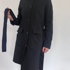 Classy Black Coat, STCKH LM - Very nicely designed black coat. I am 166 cm tall. In the perfect condition. 