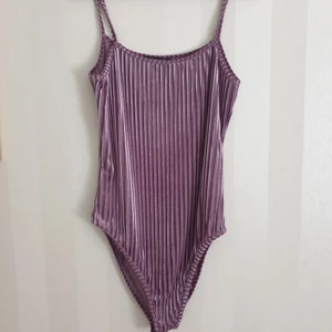 Semitransparent body with a clasp, size s - Unused purple and semitransparent body, no damage