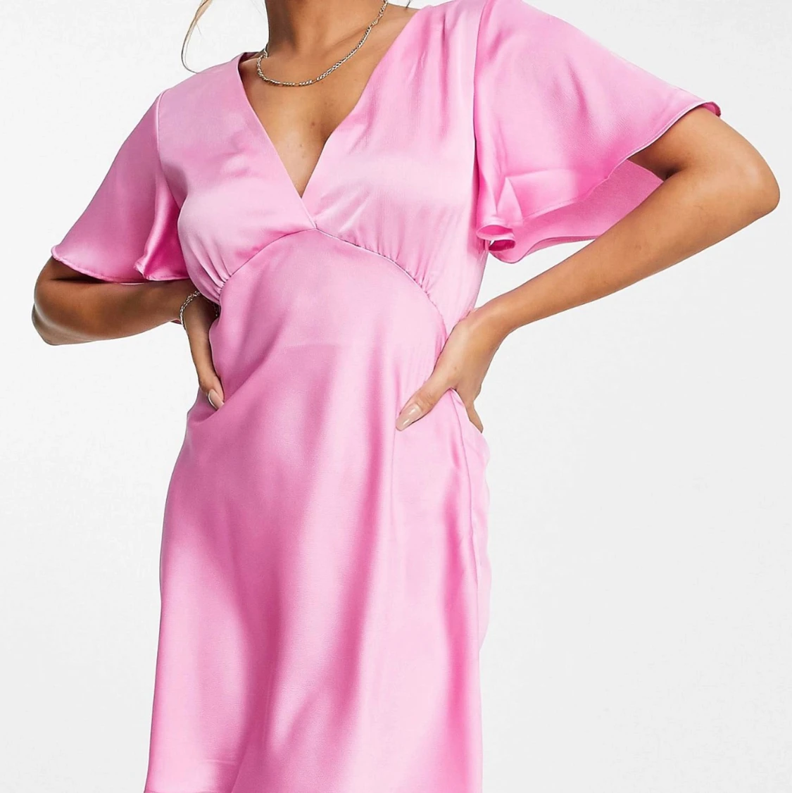 Råsa klänning med v ring