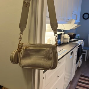 Väskan  - Vit väskan 