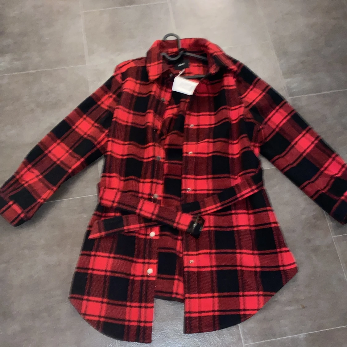 En kappa från zizzi  med prislapp kvar. - 90