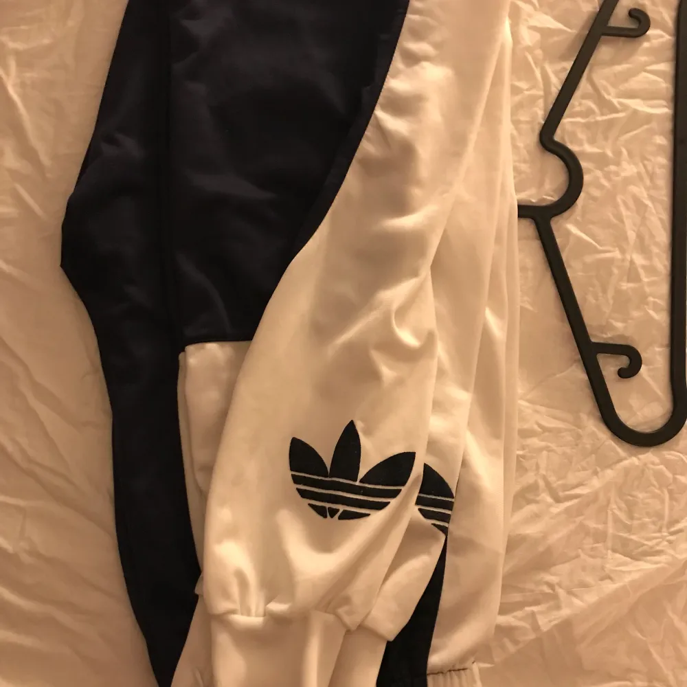A full retro adidas tracksuit.  In great condition.  Size 192 which is large.  Happy to answer any quotations.. Hoodies.