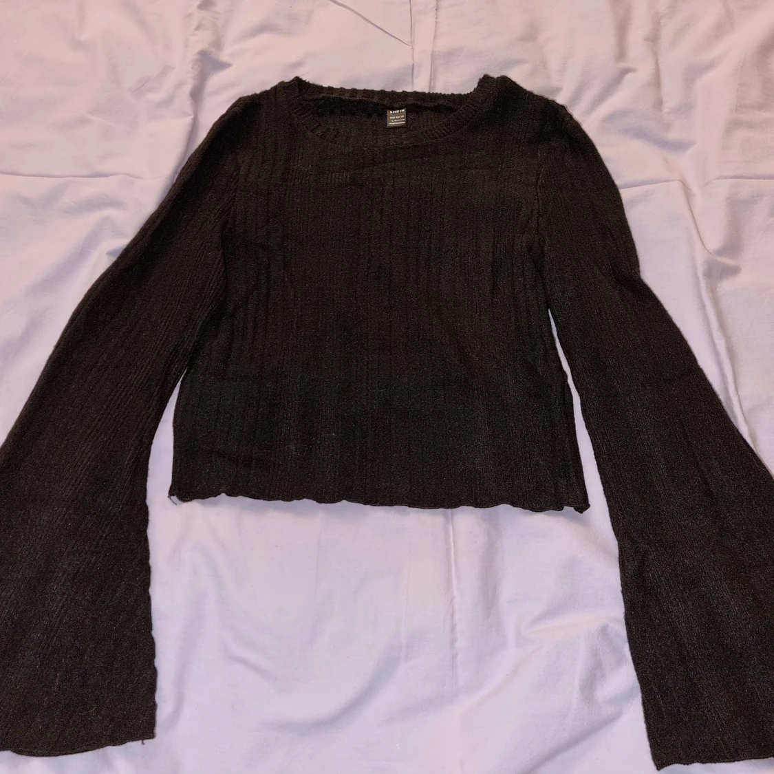Svart trumpet tröja  - 90