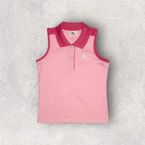 Lacoste Sleeveless Polo - PTP: 40 cm, length: 50 cm. If you are interested in the item please DM first. 