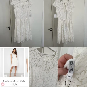 Studentklänning - Vit klänning med blommig spets, perfekt till studenten! Oanvänd, inte ens provad Storlek 40