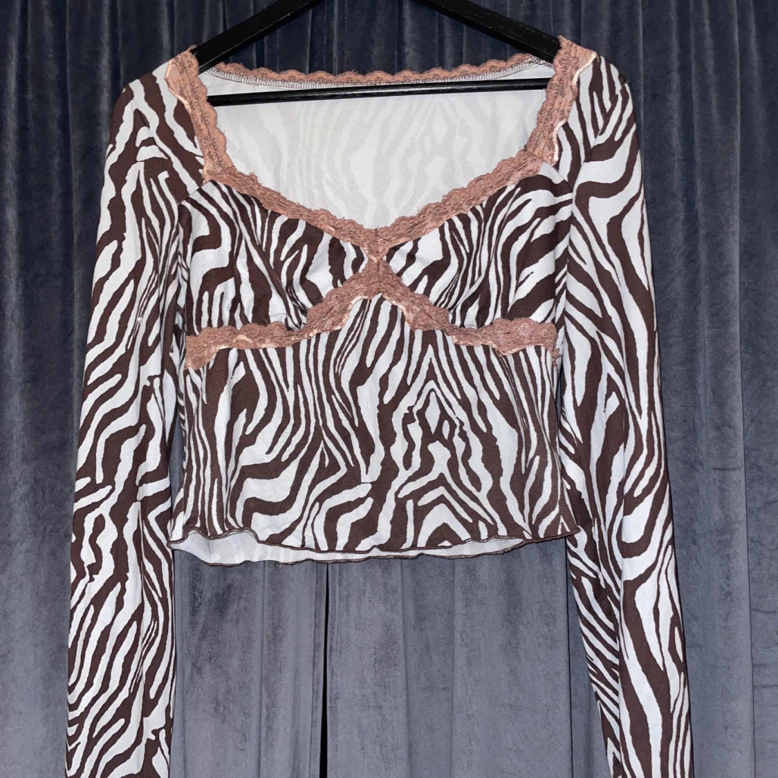 Zebrarandig tröja strl M