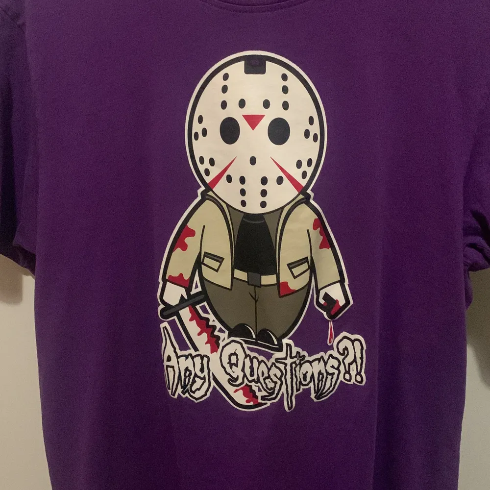 purple any questions tshirt with killer in super good condition. T-shirts.