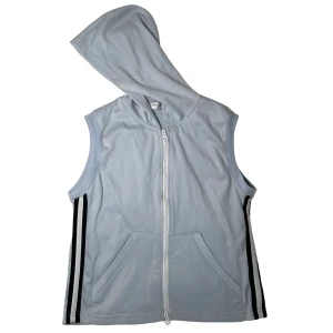 zip up linne med hoodie - Blått zip up linne med hoodie och ränder i sidorna!