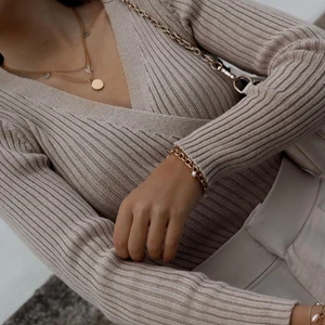 Stickad tröja - Stickad tröja från NA KD använd endast en gång. Storlek s. Färgen är beige