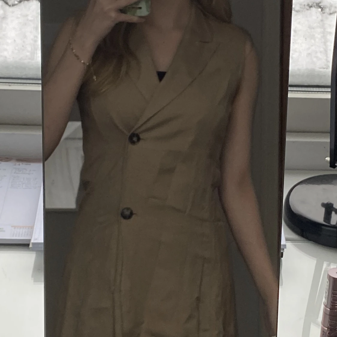 Beige kortärmad kappa