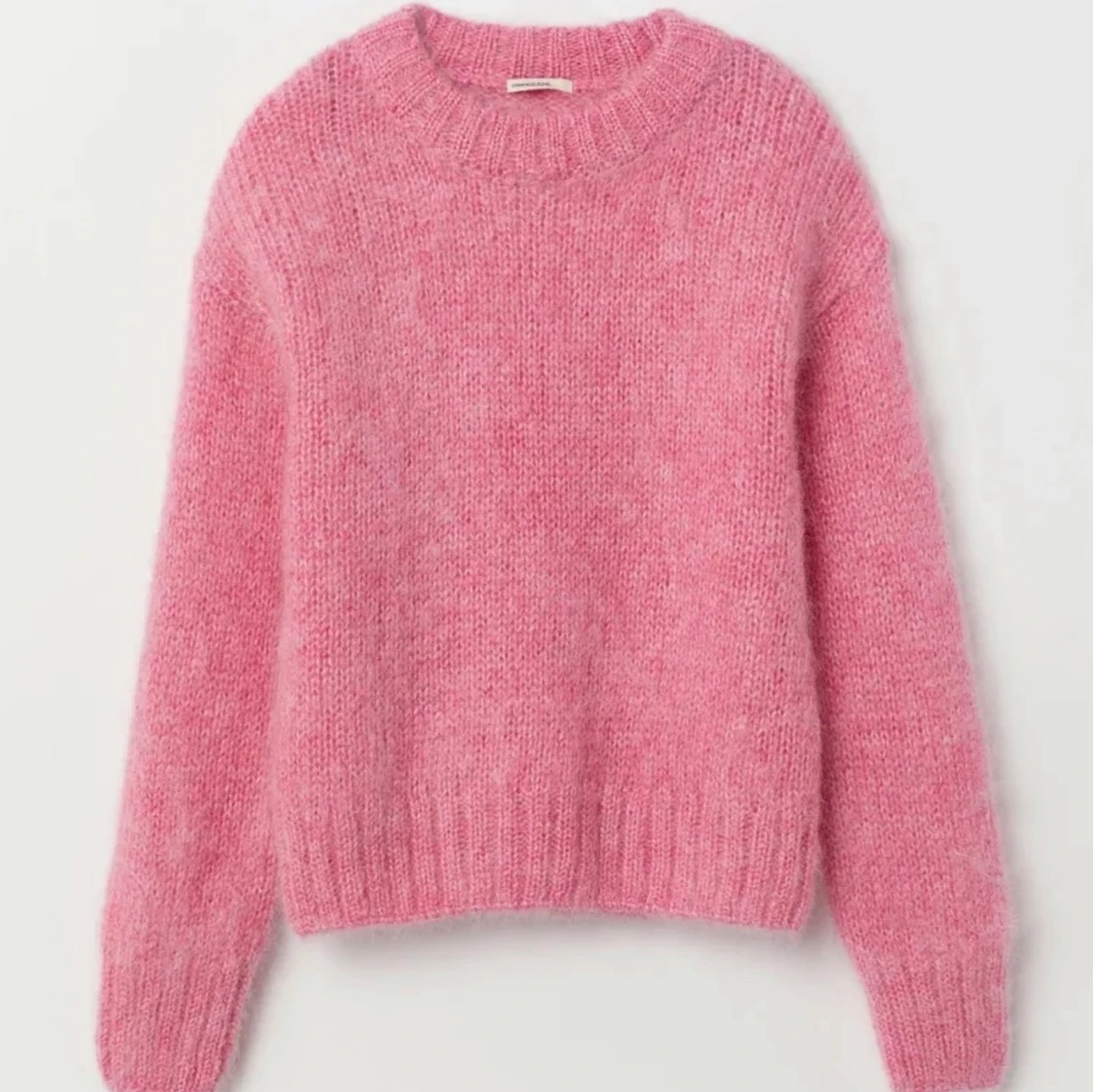 Rosa stickad tröja