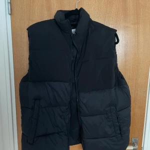 Dunväst  - Köpt i vintras 