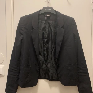 Kavaj  - Storlek 38. 