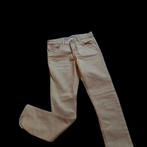Brown skinny fit jeans - Brand new jeans. Never been used before. 98% cotton. You can adjust the waist. Very soft. Perfect for summer.