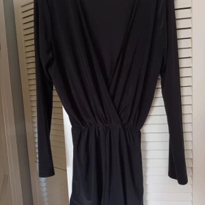 Playsuit  - Passar medium och large 