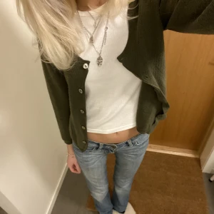 Kofta - Mörkgrön kofta med trekvartsärmar