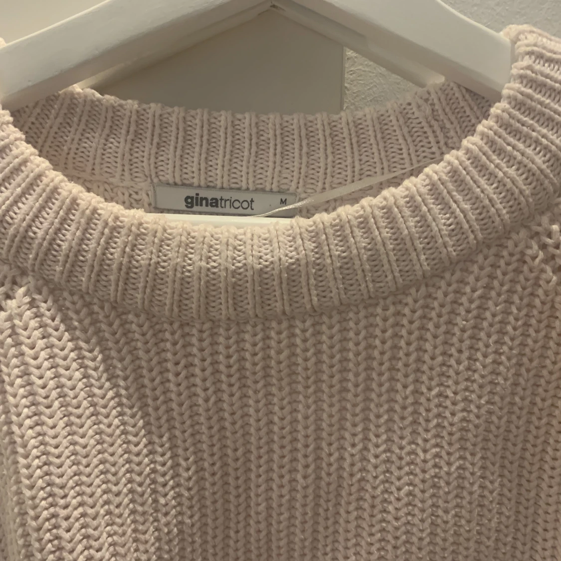 Stickad ljusrosa tröja  - 90