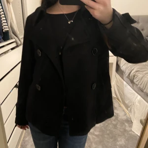 Kappa - Svart kappa, skriv vid funderingar Frakt ingår ej 