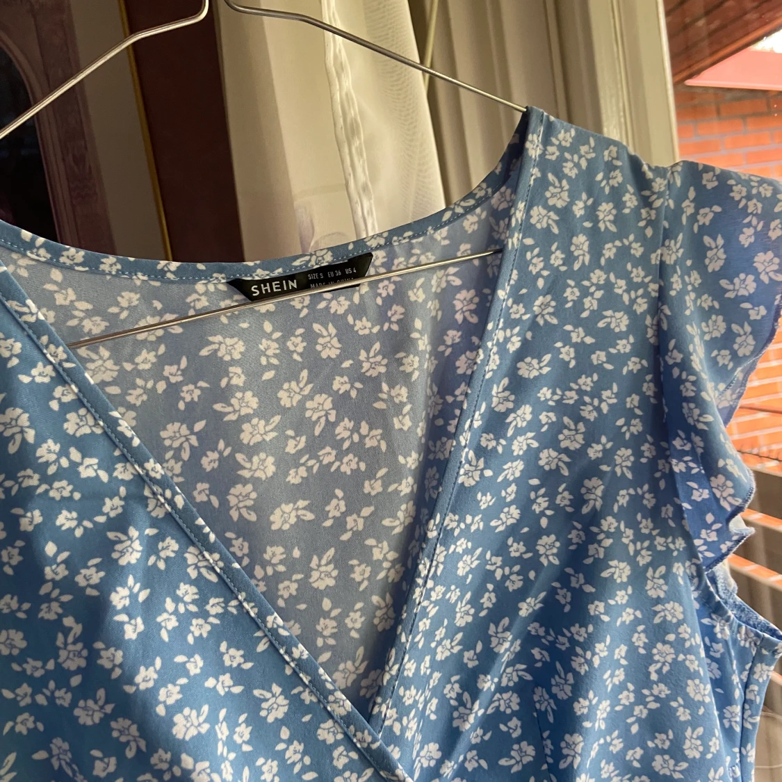 Blommig klänning - 90