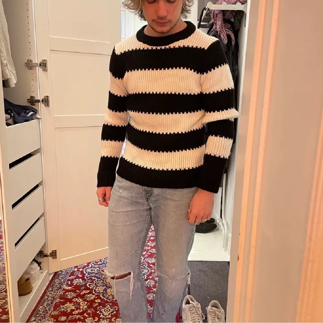 Randig stickad tröja från Sandro