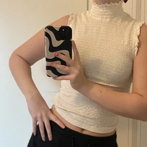 Polotopp - Topp med polokrage passar XS/S. H&M