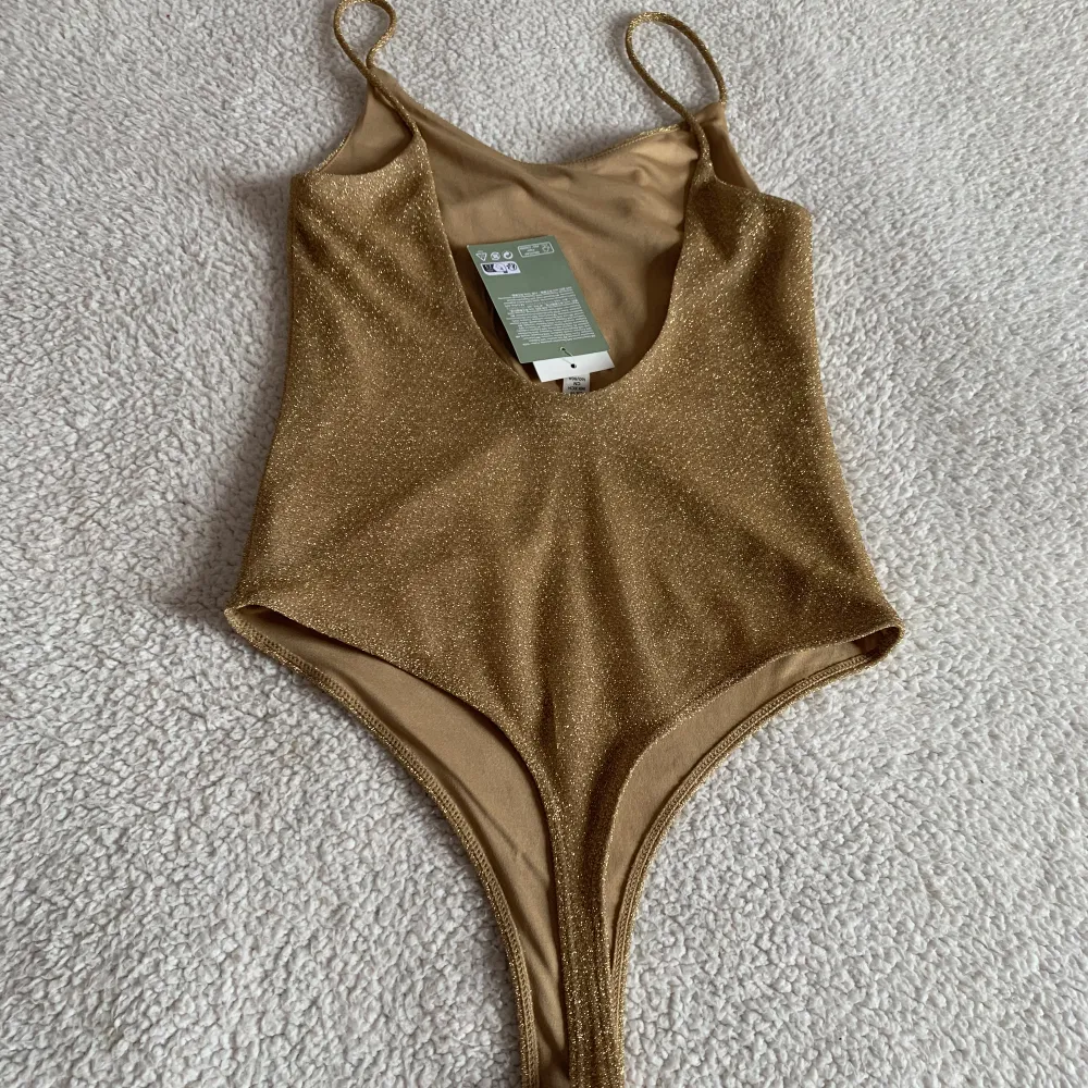 Glitter body h&m sale