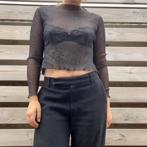 Brandy Melville mesh - Snygg glittrig mesh från Brandy Melville.