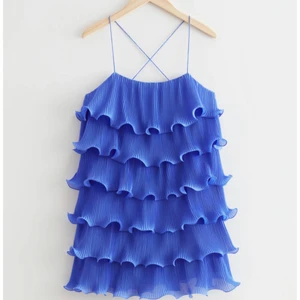 Strappy Ruffle Mini Dress  - Klänning i nyskick, endast använd 1 gång. 