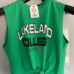 Grönt linne - Grönt linne med knytning fram