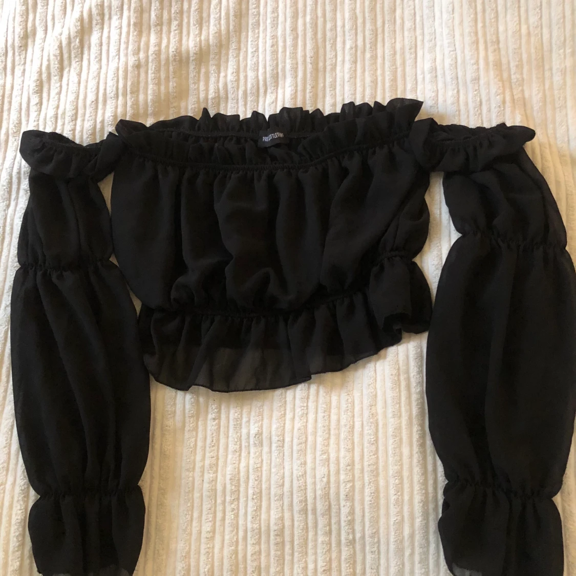 Svart festtopp i mesh