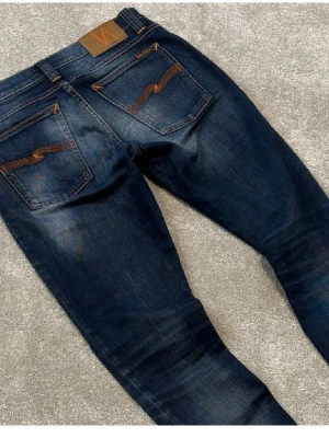 Nudie Jeans - Tjena! Säljer dessa riktigt schyssta blå Nudie jeans med fet tvätt! Skick | 9/10 | | st 29/32 | 🍾plick skär ut större delar av bilden så skriv om due intresserad!👍