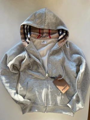 Grey burberry zip up hoodie - Brand new zip up hoodie burberry size M 