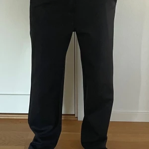 Kostymbyxor  - Svarta kostymbyxor. Storlek S.