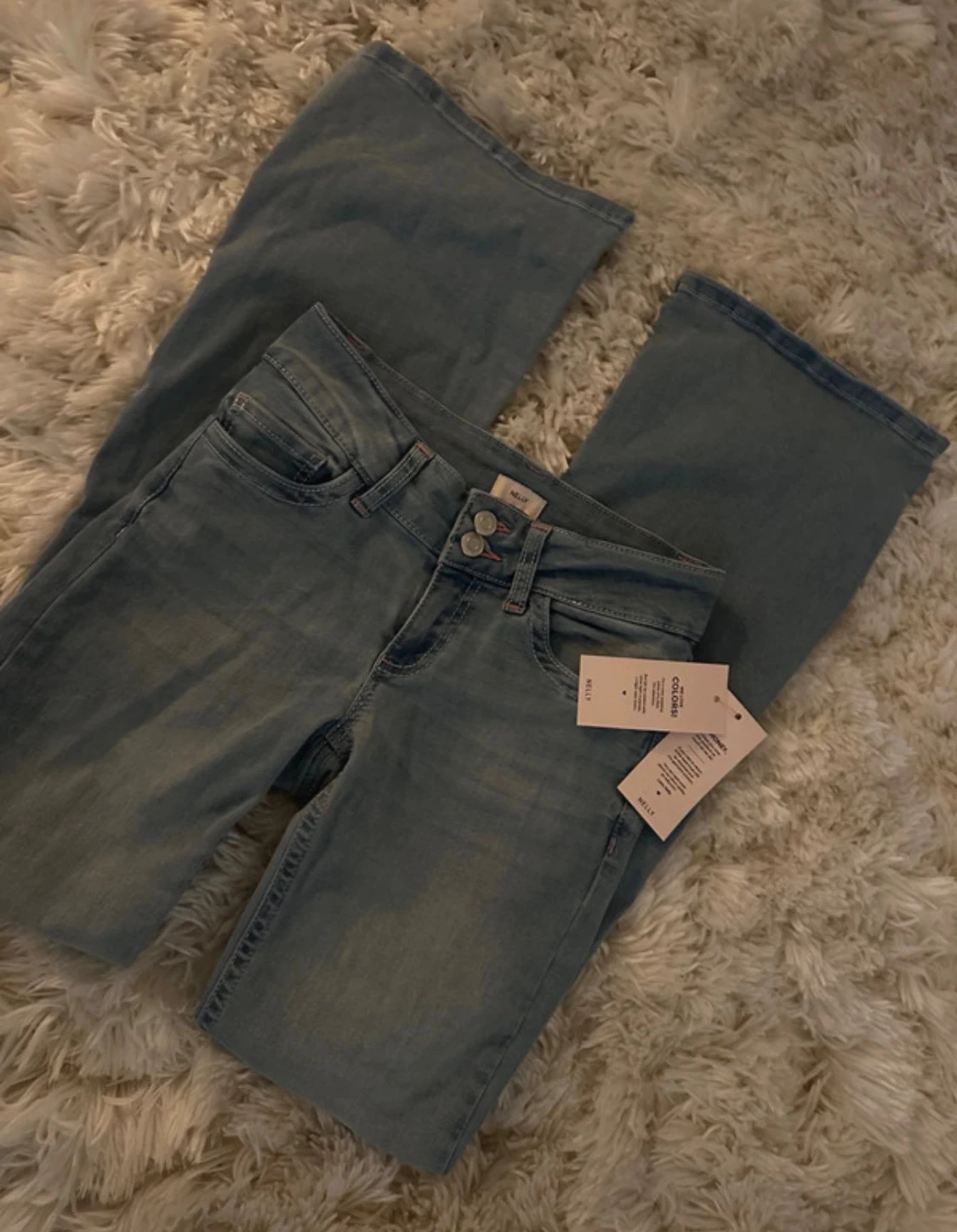 Nelly- Low waist bootcut stitch jeans