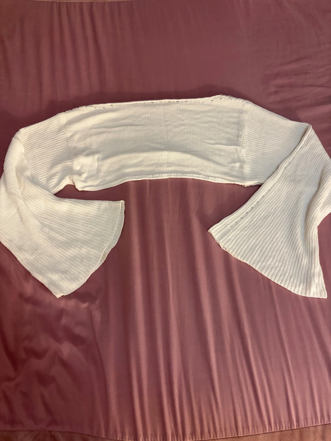 Vit stickad topp med breda ändar