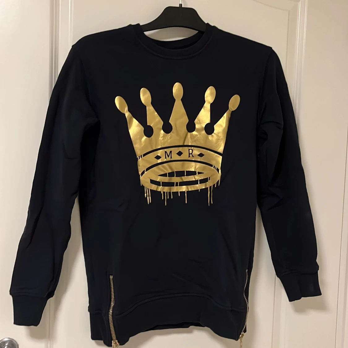 Svart sweatshirt med guldtryck Originals