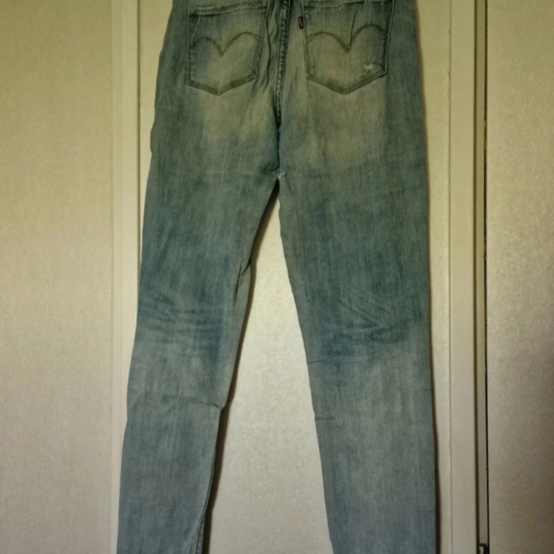 Levis 511 ljusblå slitna jeans - 1